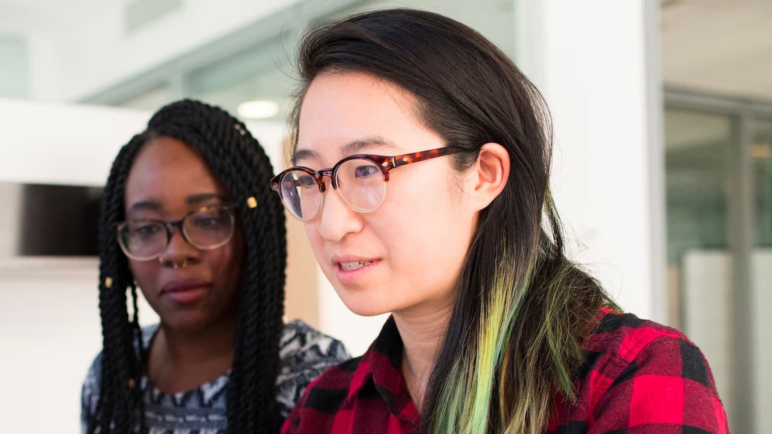 Theo Johnson at work with a colleague